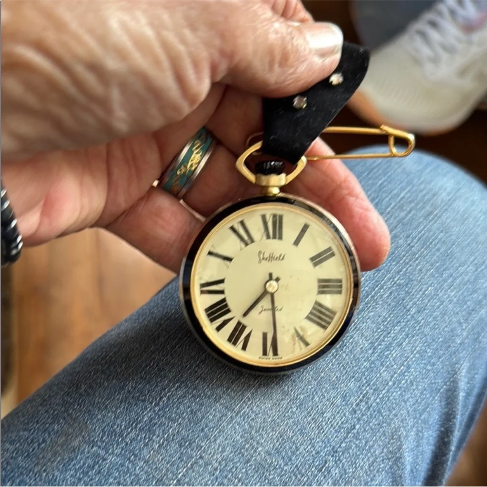 vintage Sheffield‎ Home black and gold pocket watch.